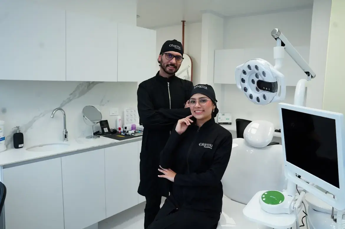 Dr. Jorge Mario Mejia Correa, Lead Cosmetic Dentist, and Valeria Foronda, Clinical Coordinator, at Be Dharma Dental treatment room in Medellin
